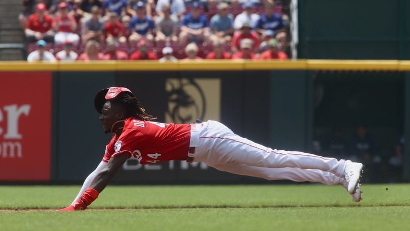 Elly De La Cruz, of the Reds, steals second base in the second inning against the Dodgers on Thursday, June 8, 2023, at Great American Ball Park in Cincinnati. David Jablonski/Staff