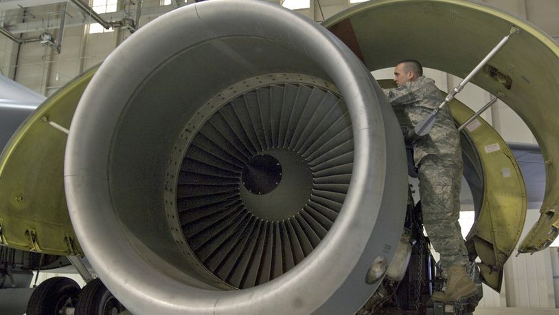 Tech. Sgt. Stefan Sianis inspects a KC-135R Stratotanker F108-100 engine before it is lowered from the aircraft in this 2010 file photo at McConnell Air Force Base, U.S. Air Force photo/Senior Airman Abigail Klein)