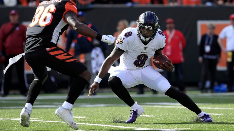 CINCINNATI, OHIO - NOVEMBER 10: Lamar Jackson #8 of the Baltimore Ravens runs with the ball during the game against the Cincinnati Bengals at Paul Brown Stadium on November 10, 2019 in Cincinnati, Ohio. (Photo by Andy Lyons/Getty Images)