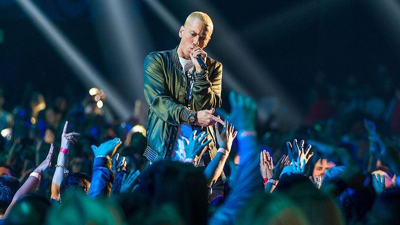 Recording artists Eminem performs onstage at the 2014 MTV Movie Awards at Nokia Theatre L.A. Live on April 13, 2014 in Los Angeles, California.  (Photo by Christopher Polk/Getty Images for MTV)