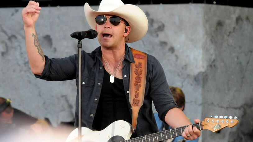 Justin Moore performs on the main stage at Country Concert 17 on Thursday, July 6. The three-day country music festival at Hickory Hills Lake in Fort Loramie runs through Saturday, July 8. David A. Moodie, Contributing Photographer.