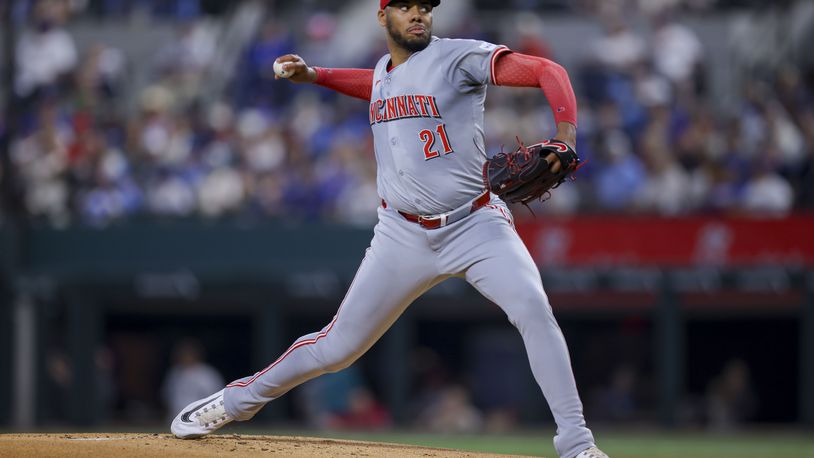 Cincinnati Reds pitcher Hunter Greene delivers during the first inning of a baseball game against the Texas Rangers in Arlington, Texas, Saturday, April 27, 2024. (AP Photo/Gareth Patterson)