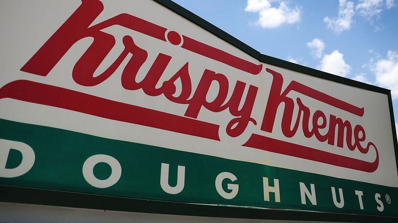 Police officers had some fun after a fire was put out on a Krispy Kreme delivery truck.