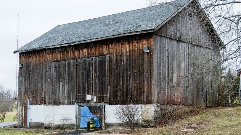 The old barn, which was home to many stray cats over the years, and the unused Park Ranger station are set to be demolished, which will be the first steps in the renovation of Harbin Park. GREG LYNCH/STAFF