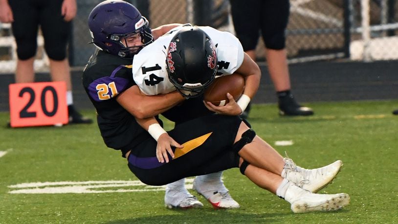 Bellbrook's Jonah Atchison tackles Franklin's Drew Isaacs during their game at Bellbrook on Friday, Sept. 4, 2020. Nick Falzerano/CONTRIBUTED