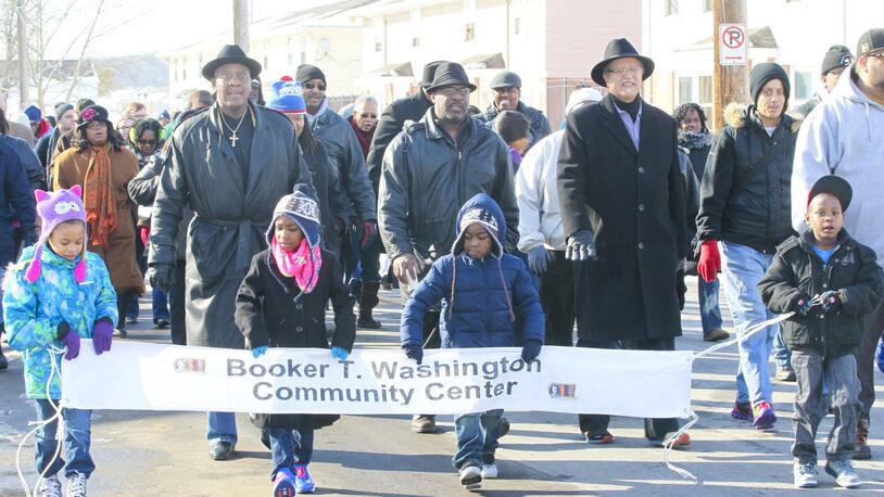 Church leaders and community members take part in Hamilton’s annual Martin Luther King Jr. Day march in 2014. This year’s march starts at 11 a.m. Monday at the Booker T. Washington Community Center, 1140 S. Front St.