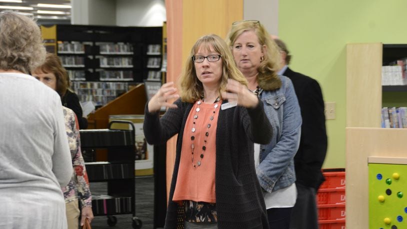 Fairfield Lane Library Branch Manager Valerie Simmons tells the Lane Library Board of Trustees on Monday about the new renovations in the Children’s Library section. The entire library went through a lengthy renovation that started in the fall of 2016. MICHAEL D. PITMAN/STAFF