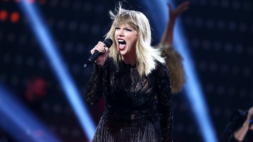 In this Feb. 4, 2017 file photo, Taylor Swift performs at the DIRECTV NOW Super Saturday Night Concert in Houston, Texas. Swift isnât nominated for an award, but she could own the night at the 2017 MTV Video Music Awards. The pop star who dominated headlines all week with anticipation of new music will debut a music video at the show Sunday.   (Photo by John Salangsang/Invision/AP, File)