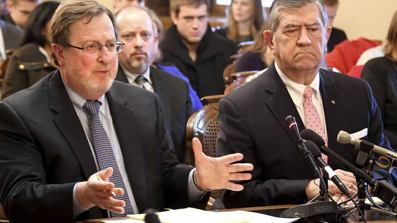 Election lawyers Gary Gordon, left, and John Pirich testify against a proposed recount as members of the Michigan Board of Canvassers meet to certify the presidential election and hear from a party asking for a recount on Monday, Nov 28, 2016 in the Capitol in Lansing. Nearly three weeks after Election Day, Michigan officials certified that Donald Trump won the state by 10,704 votes out of nearly 4.8 million to claim all of its 16 electoral votes. Jill Stein’s Green Party served notice that it would petition for a Michigan recount even as her party pushed forward with recount efforts in Wisconsin and Pennsylvania. (Dale G. Young/Detroit News via AP)