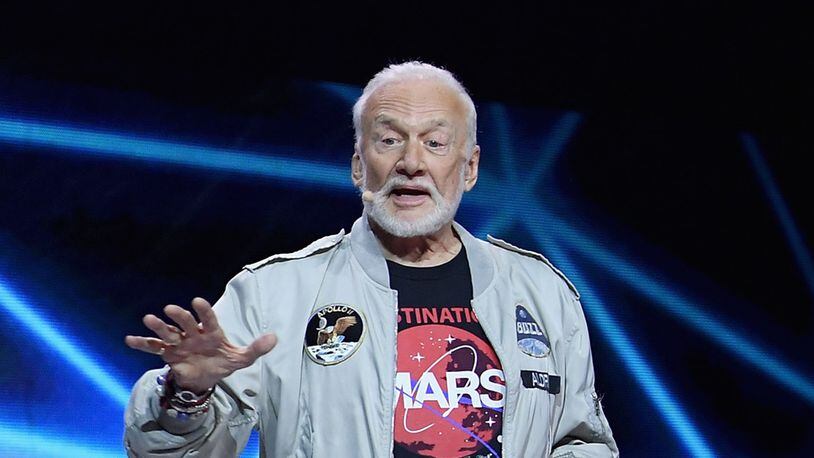 Astronaut Buzz Aldrin was seen on video getting upset with a Delta Air Lines agent when he missed his flight.