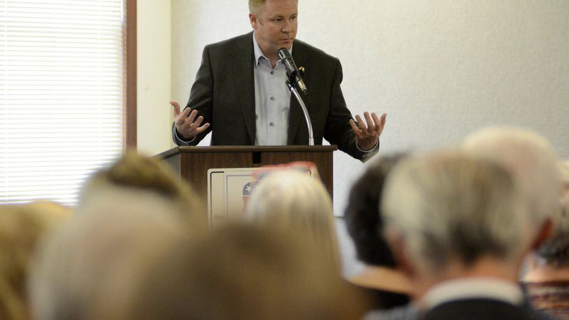 U.S. Rep. Warren Davidson, R-Troy, speaks to constituents on Wednesday afternoon, April 19, 2017, in Oxford. He addressed a variety of topics, including immigration, to the crowd of about 75 people. MICHAEL D. PITMAN/STAFF