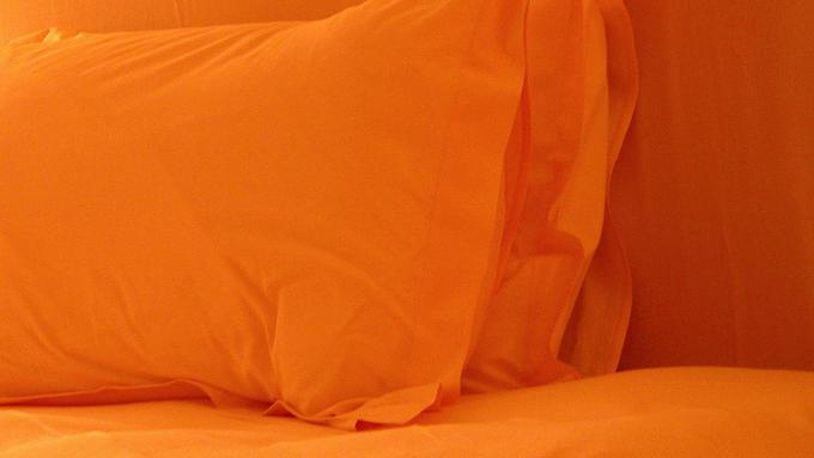 Pillows on bed (stock photo). (Photo credit: clarita via Morguefile.com)