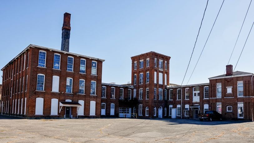 Hamilton is considering creating its own port authority, an economic development tool designed to help the city ensure economic stabilization in the future. This is the former Shuler & Benninghofen Woolen Mill in the business district in the Lindenwald area of Hamilton. NICK GRAHAM/STAFF