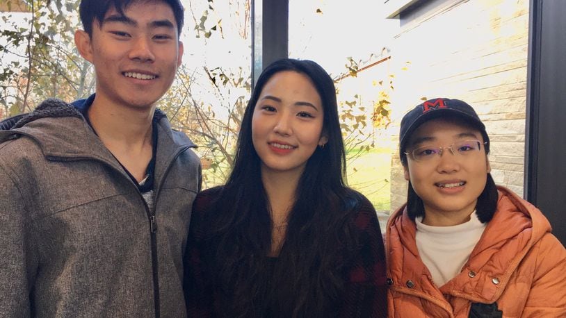 This week Miami University was one of only five schools nationally to win a prestigious award for inclusion programs for international students. Three of Miami’s 3,177 foreign-born students - (left to right) Diwen Chen from China; Woojin Lee, South Korea and Jing Jing Luo, China, say the national acclaim for Miami is deserved for its many and comprehensive programs designed to accommodate the needs of students like themselves. (Photo By Michael D. Clark/Journal-News)