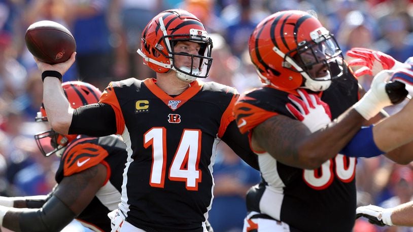 ORCHARD PARK, NEW YORK - SEPTEMBER 22: Andy Dalton #14 of the Cincinnati Bengals throws the ball during a game against the Buffalo Bills at New Era Field on September 22, 2019 in Orchard Park, New York. (Photo by Bryan M. Bennett/Getty Images)
