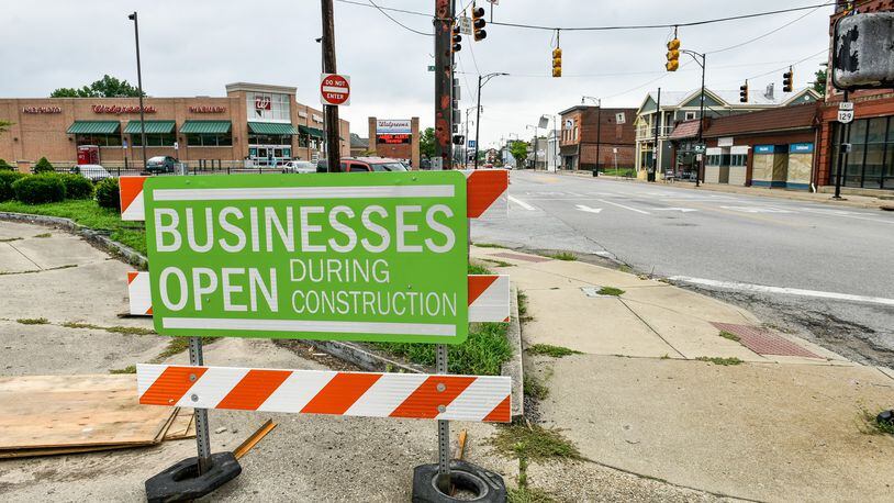 Business remain open during construction along Main Street in Hamilton.