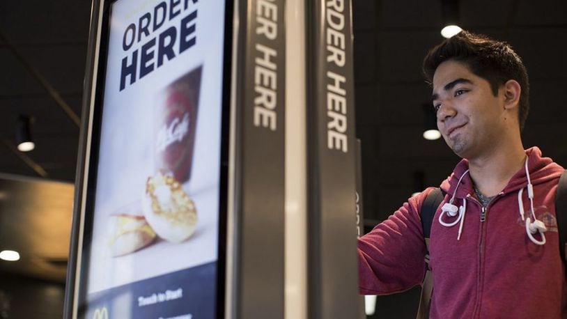 The new “Experience of the Future” conveniences at McDonald’s feature self-order kiosks in the dining room, digital menu boards in the drive-thru and Mobile Order & Pay with curbside service option using the McDonald s mobile app. CONTRIBUTED