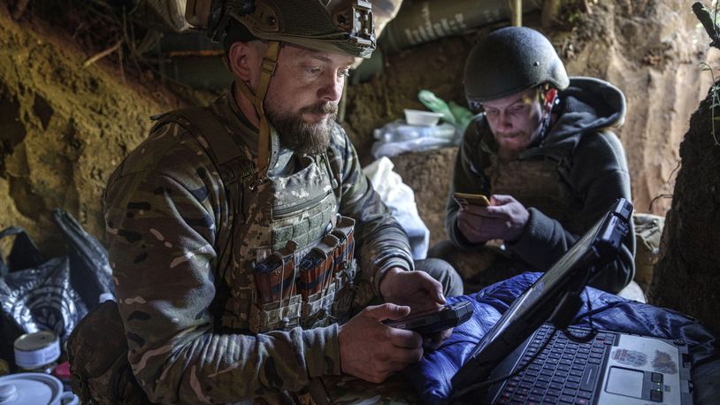 A Ukrainian serviceman Andrii of 148th separate artillery brigade of the Air Assault Forces sends receiving coordinates a Furia drone at the frontline in Donetsk region, Ukraine, Thursday May 9, 2024. (AP Photo/Evgeniy Maloletka)