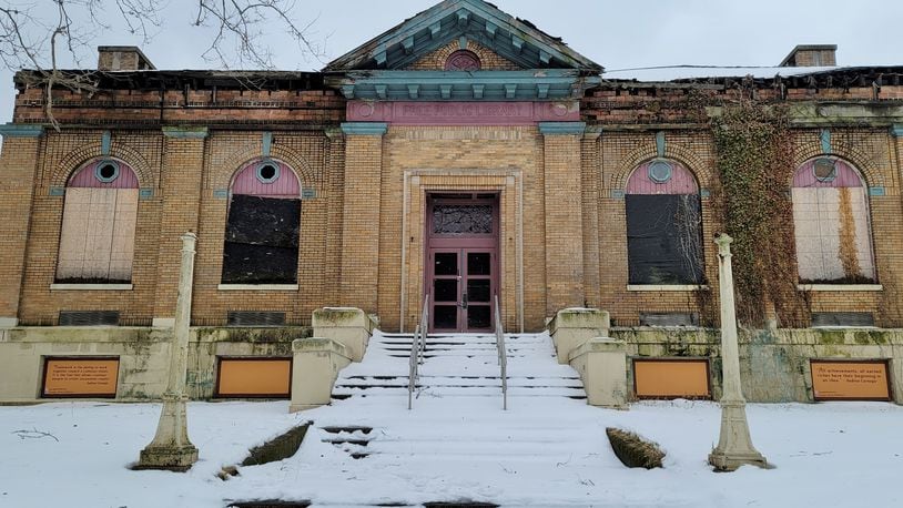 Dan Mayzum, owner of the former Carnegie Library in Middletown, has started a capital campaign in hopes of generating between $250,000 to $1 million to offset the estimated $4.3 million renovation. NICK GRAHAM/STAFF