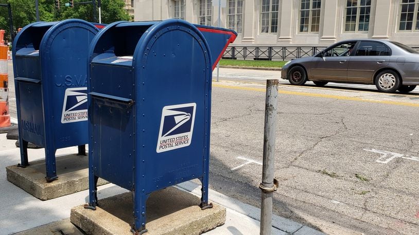 The popular drive by mail boxes on Front Street in Hamilton have been moved for a paving and sidewalk project. The move is only temporary, according to officials. NICK GRAHAM/STAFF