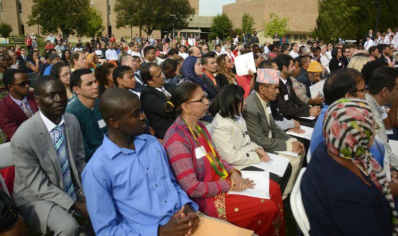 For the second consecutive year, Miami University Regionals in Hamilton hosted a naturalization ceremony on its quad.  On Sept.  15, 2016, 86 people from 38 countries took the oath of citizenship and became American citizens.  MICHAEL D. PITMAN / STAFF