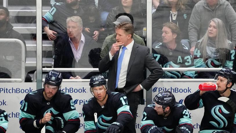 FILE - Seattle Kraken head coach Dave Hakstol looks on from the bench against the Colorado Avalanche during the third period of Game 4 of an NHL hockey Stanley Cup first-round playoff series Monday, April 24, 2023, in Seattle. The Seattle Kraken fired coach Dave Hakstol on Monday, April 29, 2024, after the third-year franchise took a significant step back following a playoff appearance in their second season.(AP Photo/Lindsey Wasson, File)