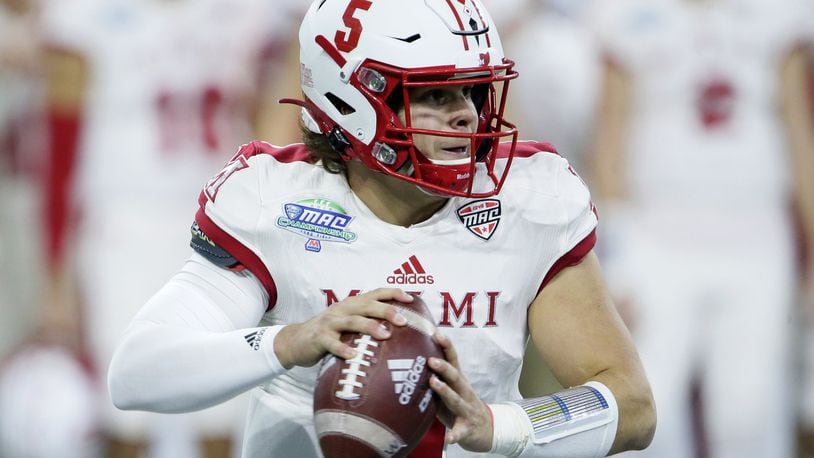 DETROIT, MI - DECEMBER 7: Quarterback Brett Gabbert #5 of the Miami (Oh) Redhawks looks to pass the ball against the Central Michigan Chippewas during the first half of the MAC Championship at Ford Field on December 7, 2019, in Detroit, Michigan. (Photo by Duane Burleson/Getty Images)