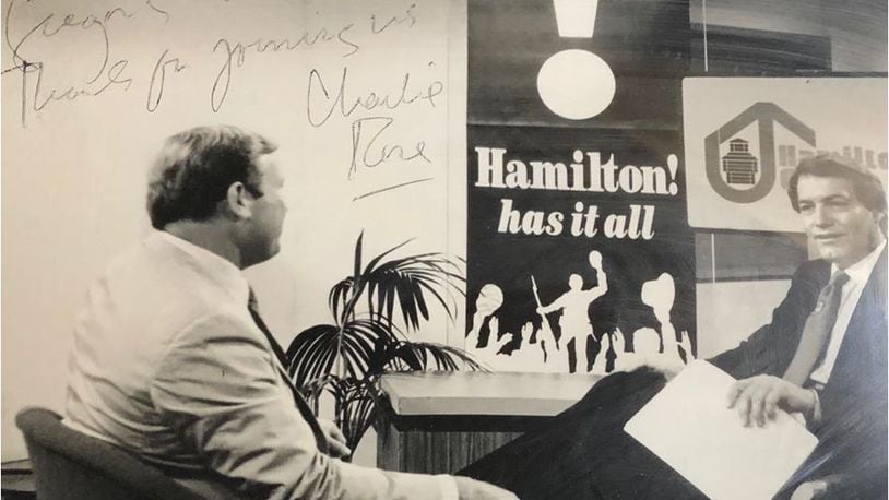 Then-Hamilton Mayor Greg Jolivette, left, was interviewed by CBS reporter Charlie Rose in 1986 about the city's effort to add an exclamation point to its name, with the punctuation in the background. PROVIDED