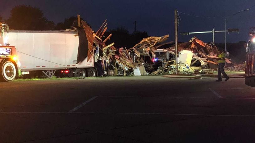 Rescues crews worked to locate the driver of a semi tractor-trailer who crashed into a weigh station early morning, Sept. 8, 2021, in Dearborn County, Indiana, near the border with Ohio. Photo by: Adam Schrand/WCPO