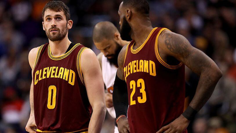 PHOENIX, AZ - JANUARY 08: (L-R) Kevin Love #0 and LeBron James #23 of the Cleveland Cavaliers during the first half of the NBA game against the Phoenix Suns at Talking Stick Resort Arena on January 8, 2017 in Phoenix, Arizona. NOTE TO USER: User expressly acknowledges and agrees that, by downloading and or using this photograph, User is consenting to the terms and conditions of the Getty Images License Agreement. (Photo by Christian Petersen/Getty Images)