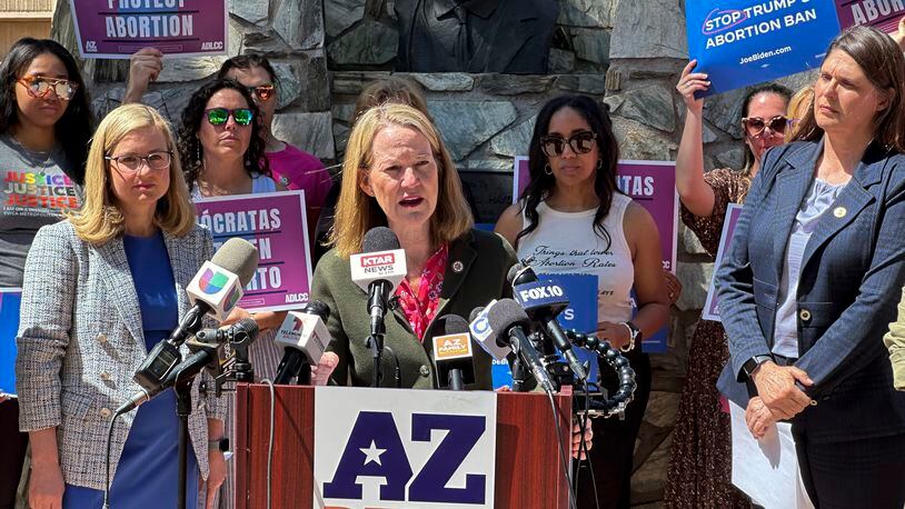 Arizona Attorney General Kris Mayes speaks to reporters at the state Capitol in Phoenix on Tuesday, April 9, 2024. (AP Photo/Jonathan Copper)