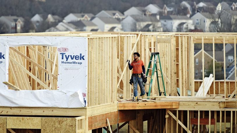 A crew works on construction of a new home on Elm Leaf Trail in 2017 in Liberty Twp’s Aspen Trails subdivision, just north of Kyles Station Road. Butler County’s new home construction numbers dipped just 0.5 percent last year but remained a sizable portion of overall totals. STAFF FILE PHOTO