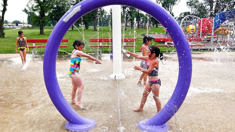 Children splash at the Douglass Park Splash Pad in Middletown. STAFF FILE PHOTO