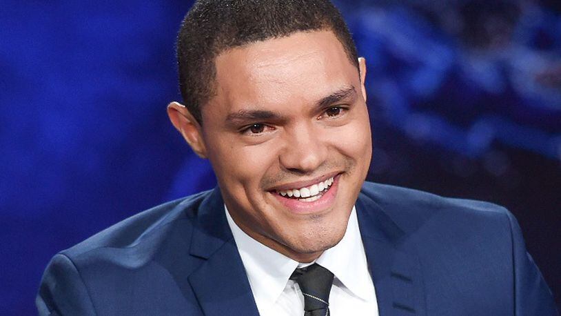FILE - In this Sept. 29, 2015 file photo, Trevor Noah appears on set during a taping of "The Daily Show with Trevor Noah" in New York. Host Noah and comedians Lewis Black and Brian Regan will be the headliners at the Lucille Ball Comedy Festival in August 2016. The annual festival takes place in Lucille Ball’s hometown of Jamestown each year. (Photo by Evan Agostini/Invision/AP, File)