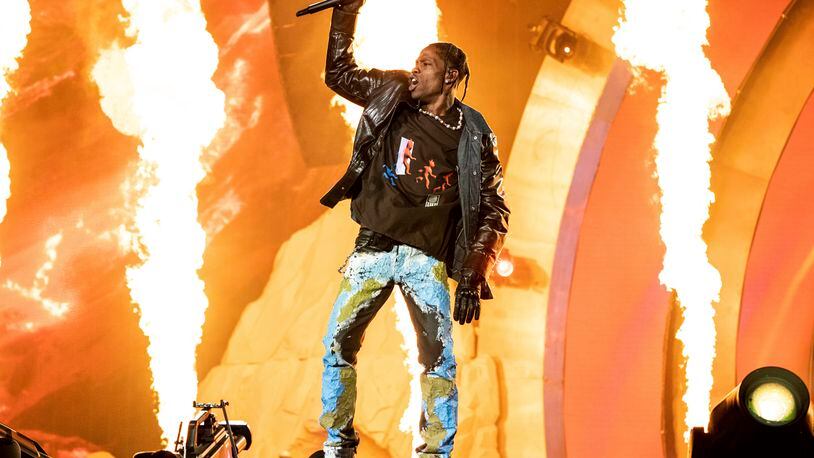 FILE - Travis Scott performs at the Astroworld Music Festival in Houston, Nov. 5, 2021. The first civil trial related to the hundreds of lawsuits filed over the deadly 2021 Astroworld festival headlined by rap superstar Scott is set to begin. Jury selection in the trial over the lawsuit filed by the family of Madison Dubiski, one of the 10 people killed at the concert in Houston, was scheduled to start on Tuesday, May 7, 2024, in Houston. (Photo by Amy Harris/Invision/AP, File)