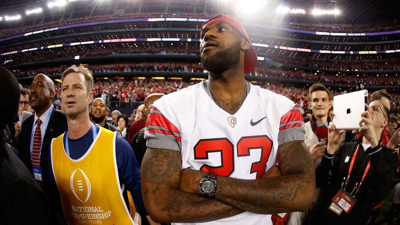 ARLINGTON, TX - JANUARY 12:  LeBron James of the Cleveland Cavaliers looks on after the Ohio State Buckeyes defeated the Oregon Ducks 42 to 20 in the College Football Playoff National Championship Game at AT&T Stadium on January 12, 2015 in Arlington, Texas.  (Photo by Christian Petersen/Getty Images)