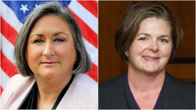 Attorney Elizabeth Yauch (left), the Butler County Democratic Party’s endorsed candidate for Middletown Municipal Court judge said in a voicemail to one of her Republican opponents: “I really do want you to win Melynda.” Since leaving the voicemail for Melynda Cook Howard (right), Yauch said she is now “all in” and wants to win on Nov. 7 to serve the remaining two years of the late Judge Mark Wall’s unexpired term.