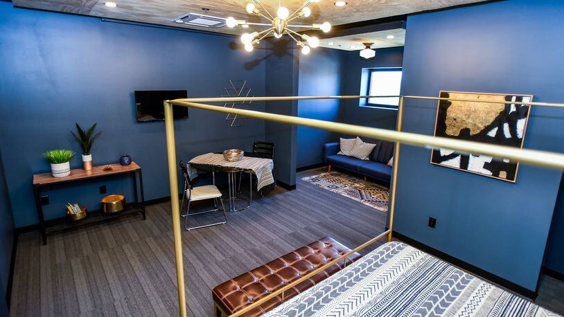 A new boutique hotel is open in downtown Middletown. Indigo Pass occupies the fourth floor of the 38,000-square-foot Torchlight Pass building at 1131 Central Ave. It has already attracted guests from Indianapolis, Seattle and Albuquerque. NICK GRAHAM/STAFF