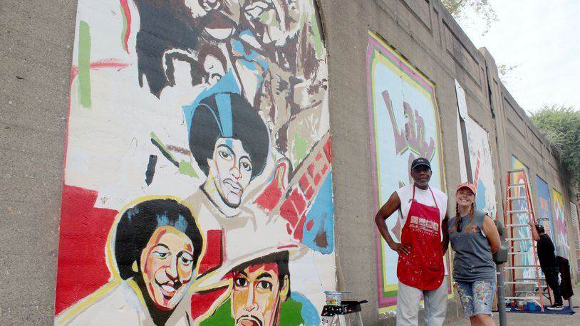 Dayton artist Morris Howard and Brittini Long of Montgomery County Juvenile Court are leading an effort to create a funk wall on Stone Street.