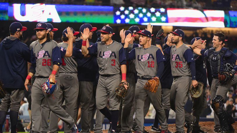 Team United States celebrate their 2-1 win over team Japan at the end of the ninth inning in Game 2 of the Championship Round of the 2017 World Baseball Classic at Dodger Stadium on March 21, 2017 in Los Angeles, California.