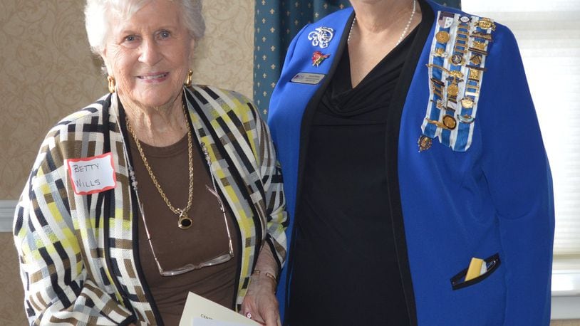 Betty Wills (left) was presented with a certificate recognizing her as a 67-year member of the Oxford Caroline Scott chapter of the Daughters of the American Revolution. She is shown with the current chapter regent, Elaine Ortman. CONTRIBUTED/BOB RATTERMAN