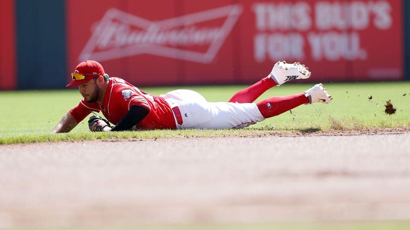 CINCINNATI, OH - SEPTEMBER 24: Eugenio Suarez #7 of the Cincinnati Reds fields a ground ball hit by Mitch Moreland of the Boston Red Sox during the second inning at Great American Ball Park on September 24, 2017 in Cincinnati, Ohio. (Photo by Kirk Irwin/Getty Images)