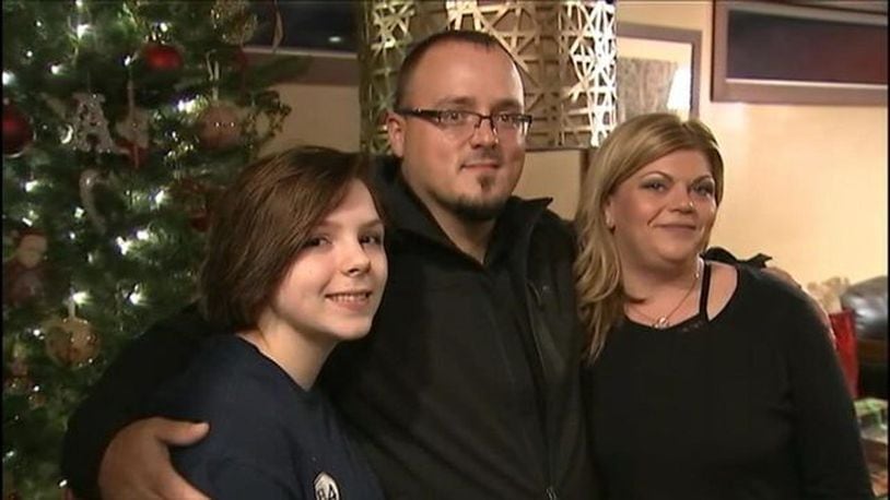 A wife helped a family escape a house fire and the husband saved a baby's iife on the side of the road Christmas Eve. (Photo: WSOCTV.com)