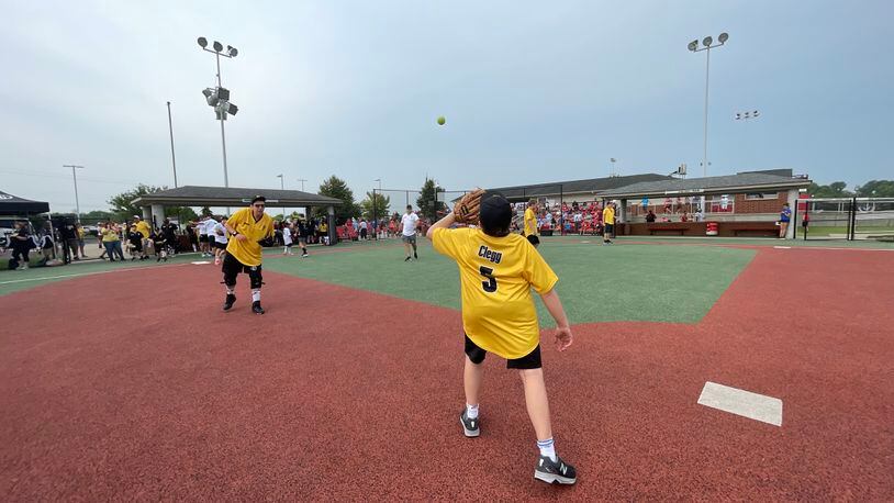 The Joe Nuxhall Miracle League in Fairfield and the Miracle League of the South Hills of Pittsburgh competed in the first of its kind matchup. Former Cincinnati Red Sean Casey’s team from Pennsylvania traveled four hours to Fairfield for the matchup. The Fairfield team will travel to Pittsburgh next summer. Pictured is MLSH player Cody Clegg fielding a ball during warms on Lance Cpl. Taylor Prazynski Field at the JNML Fields in Fairfield. MICHAEL D. PITMAN/STAFF