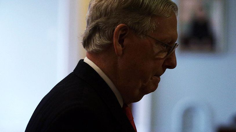 WASHINGTON, DC - APRIL 06:  U.S. Senate Majority Leader Sen. Mitch McConnell (R-KY) walks towards the Senate Chamber at the Capitol April 6, 2017 in Washington, DC. Senate Republicans are expected to exercise the so called "nuclear option" to break a Democratic filibuster and pave the way to confirm President Donald Trump's Supreme Court nominee Neil Gorsuch.  (Photo by Alex Wong/Getty Images)