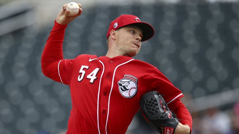 Cincinnati Reds starting pitcher Sonny Gray throws against the Los Angeles Dodgers during the first inning of a spring training baseball game Monday, March 2, 2020, in Goodyear, Ariz. (AP Photo/Ross D. Franklin)