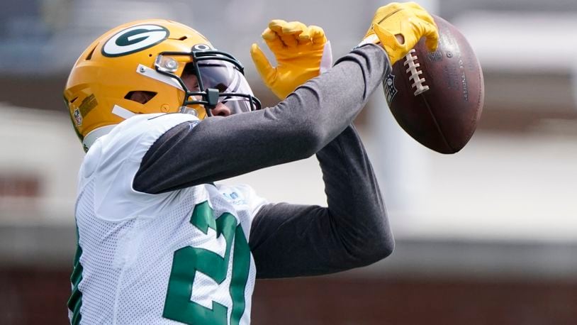 Green Bay Packers' Danny Davis runs a drill at the NFL football team's practice field training camp Tuesday, May 24, 2022, in Green Bay, Wis. (AP Photo/Morry Gash)