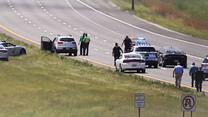 An investigator from the Warren County Coroner’s Office is responding to a shooting reported on I-75 south near Austin Boulevard. MARSHALL GORBY/STAFF