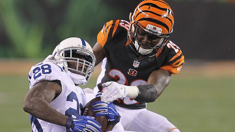 CINCINNATI, OH - SEPTEMBER 01: Jordan Todman #28 of the Indianapolis Colts runs the football upfield against Tony McRae #29 of the Cincinnati Bengals at Paul Brown Stadium on September 1, 2016 in Cincinnati, Ohio. The Colts defeated the Bengals 13-10. (Photo by John Grieshop/Getty Images)