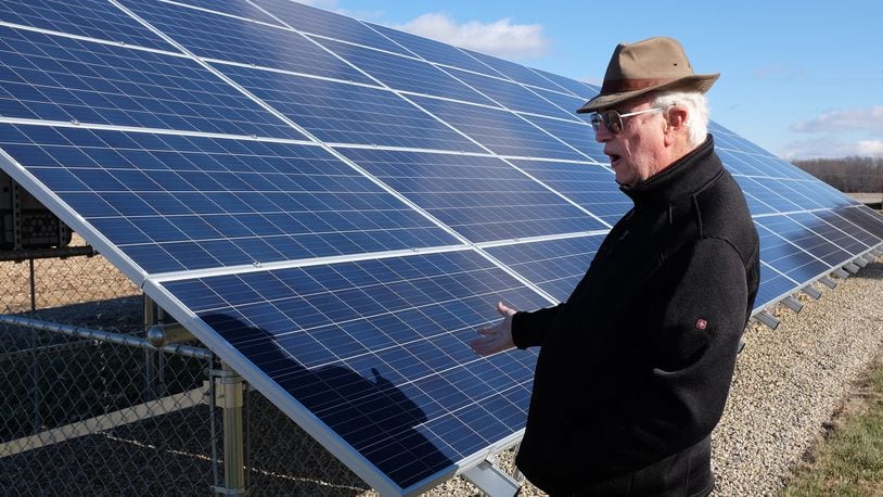 Hamilton officials are developing regulations for how the city’s electric utility would purchase solar electricity from its residential customers. Here, James Groeber, owner of Ohio Solar Electric, LLC, talks about the solar system he installed at a Clark County farm in December 2015. BILL LACKEY/STAFF 2016